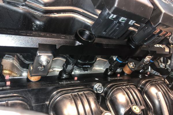 Radium port injection rail with phenolic isolation, sold by Tuned By Shawn