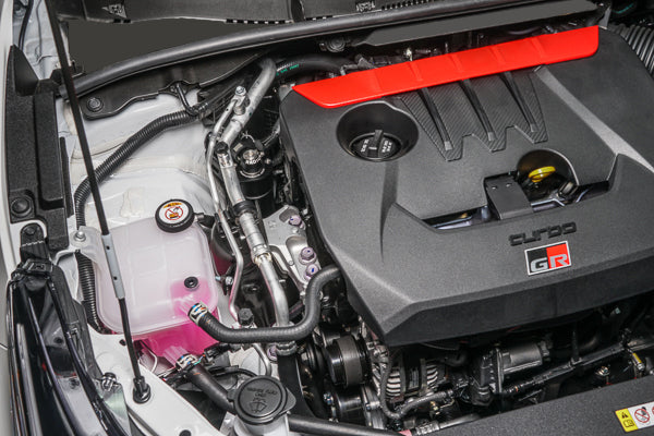 Radium GR Corolla catch can under OEM engine cover, sold by Tuned By Shawn