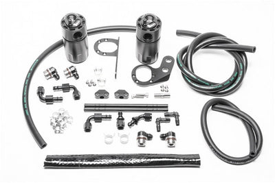 Radium CCV catch can under FK8 engine cover, sold by Tuned By Shawn