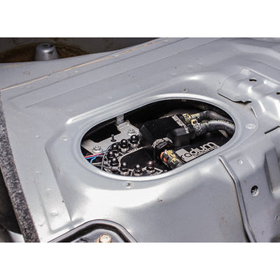 Radium drop-in Subaru hanger with OEM sender retained, Tuned By Shawn