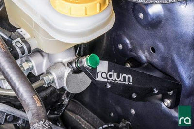 Billet Radium master cylinder brace with green preload bolt, Tuned By Shawn