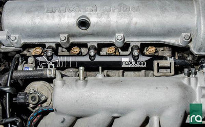 Radium BP 1.8L fuel rail with phenolic insulating washers, sold by Tuned By Shawn